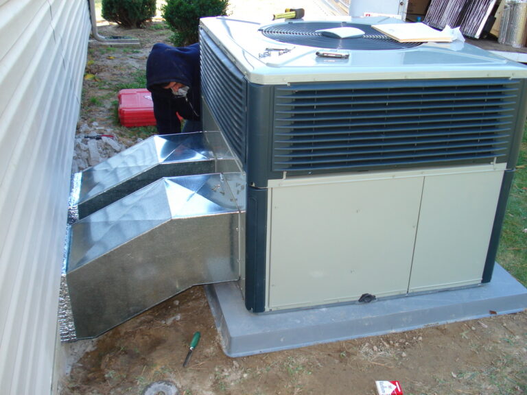 Wicomico tech working on outdoor unit