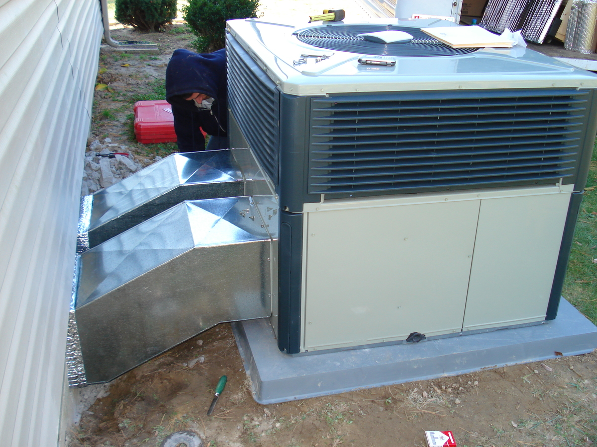 Wicomico tech working on outdoor unit