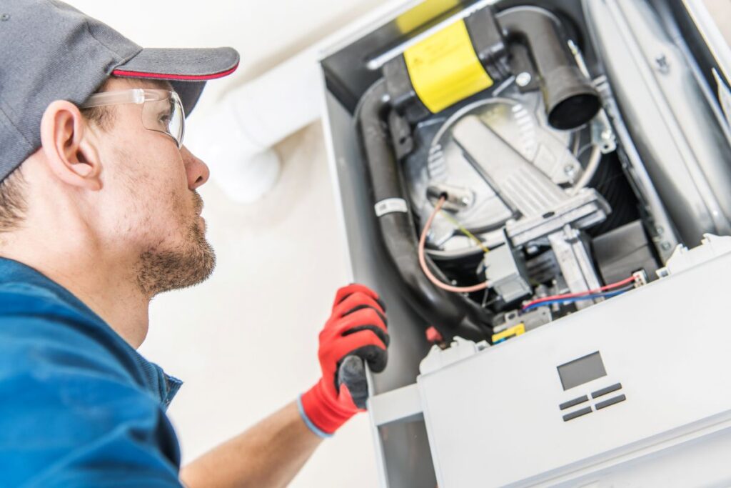 Tech working on furnace